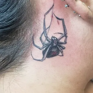 Small detail spider tattoo done by Cyn