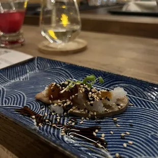 New York State foie gras, daikon radish, sesame, balsamic redaction