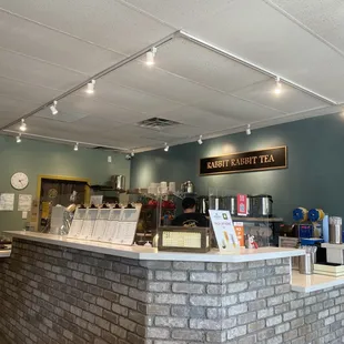 a brick counter in a cafe