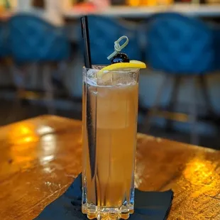 a drink in a tall glass