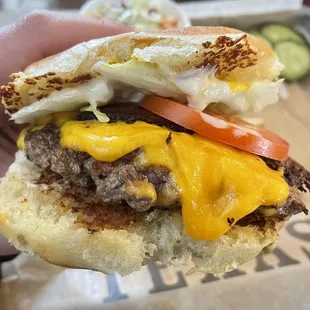 The outstanding prime brisket burger on a jalapeño bun