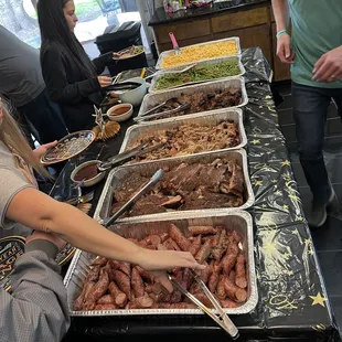 Sausage, ribs, pulled pork, brisket, green beans,and mac and cheese and