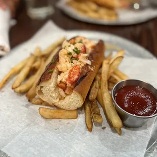 a lobster sandwich and french fries