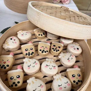 a basket full of cookies with faces