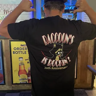 the back of a man in a black shirt