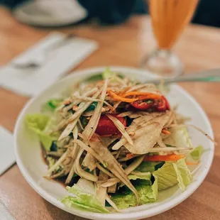 a plate of salad on a table