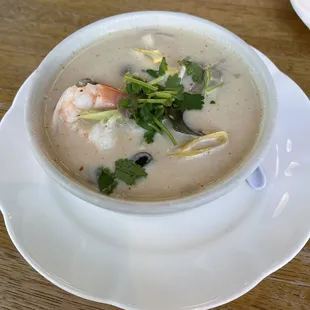 Cup of Tom Ka Soup with prawns