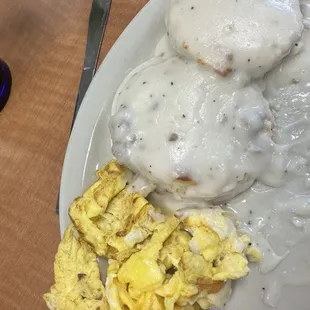 Not soft scrambled eggs and biscuits and barely there sausage gravy