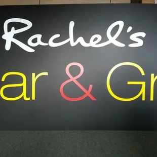 a sign for rachel's bar and grill