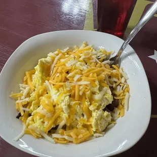 Breakfast bowl with potato's, scrambled eggs and ham!