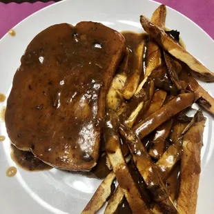 Hot roast beef sandwich and hand cut fries covered in this amazing gravy