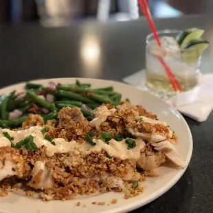 They created a Keto almond crusted Pollock, seared on the flattop with a lemon dill sauce, and a side of baked green beans for my Keto