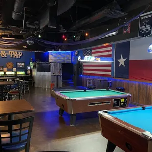 Pool tables. Karaoke stage.