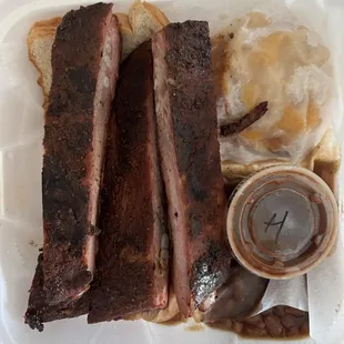 Rib dinner with peach cobbler and baked beans