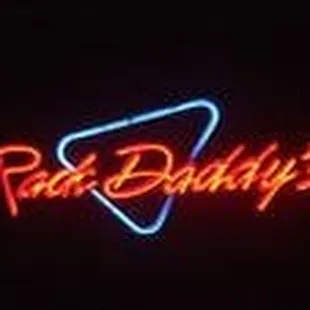 a neon sign in the dark