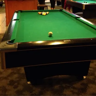 a pool table with balls on it