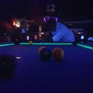 billiards playing pool
