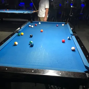 a man playing pool