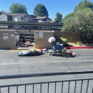 Show more of the disgusting trash. Also a couch been there for 2 weeks and still not picked up and appears maintainer not doing anything.