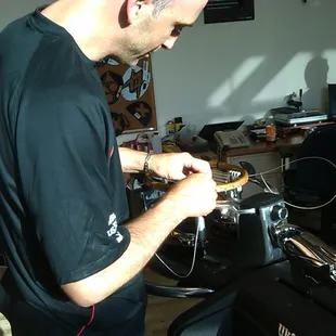 At the U.S. Open in 2010 stringing a wooden frame for the on site museum. A rare opportunity.