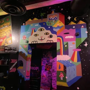a colorful mural on the wall