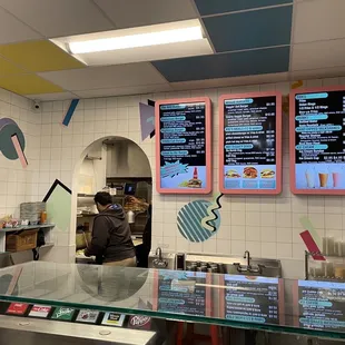 menus on the wall of the restaurant