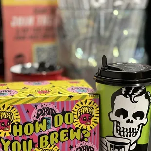 a coffee cup and a box