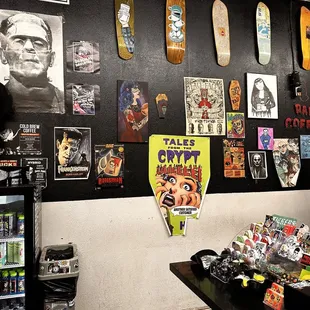 a variety of posters on the wall