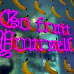 a neon sign with bananas