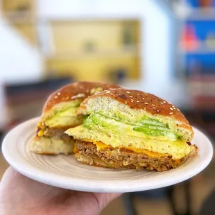 Breakfast Sandwich w/ just egg, american cheese, sesame bun, creamy herb aioli | $8 + $3 Beyond Breakfast Sausage + $2 avocado