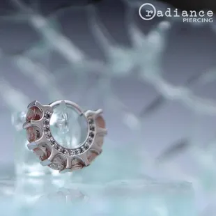 This white gold cirrus with Oregon Sunstone and Grey Diamonds creates a very stunning aesthetic!