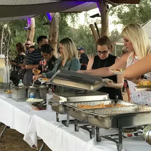 Our buffet table of 3 different tacos, rice, beans , quesadillas, and ceviche!