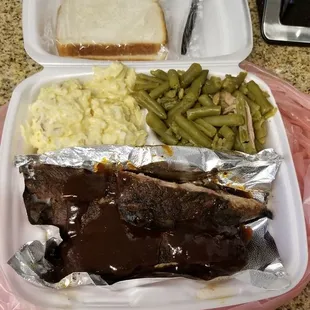 BBQ Ribs dinner with potatoe salad and green beans