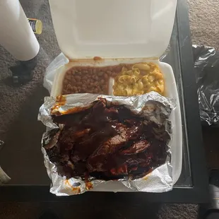 2 meat meal pulled pork &amp; brisket Mac an cheese for the side also baked beans huge pile of meat big portions