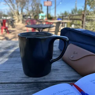 Outside getting some writing down while having a hot mocha