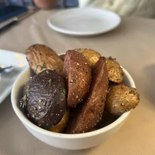 a bowl of baked potatoes