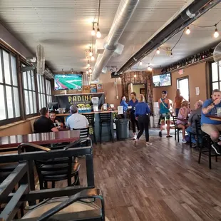 a group of people sitting at tables