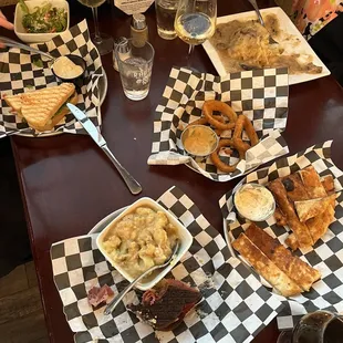 Bread and cheese! Onion rings, hot roast beef sandwich, Chicken Bacon Avocado Sandwich, and what&apos;s left of Radius Reuben Sandwich.