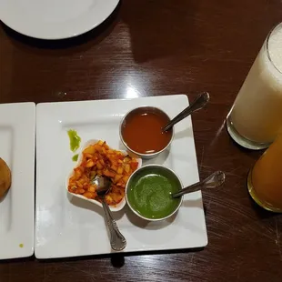 Vegetable samosas with mango chutney. Sweet Lassi &amp; Mango Lassi.