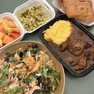 asian chicken salad, todays special (braised chicken with polenta), ciabatta, pesto pasta, fruit