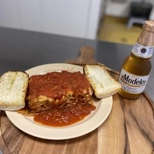 a plate of food and a beer