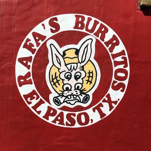 the logo on the side of a restaurant