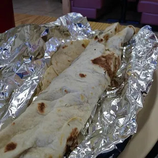 a burrito wrapped in foil