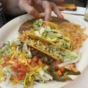 Beef tacos with rice and beans