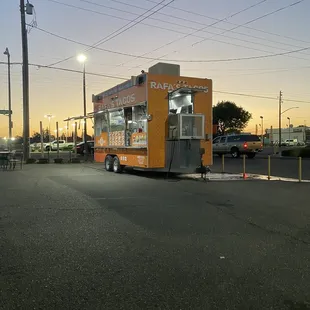 a food truck in a parking lot