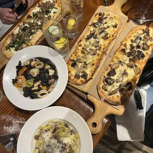 Truffle pasta, seafood pasta, truffle pizza and sausage pizza