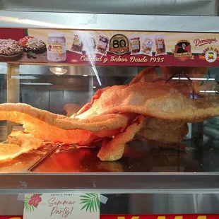 Whew!  They still have one piece of Chicharrón left.