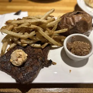 Butterflied filet with Cajun butter, sweet potato and fries