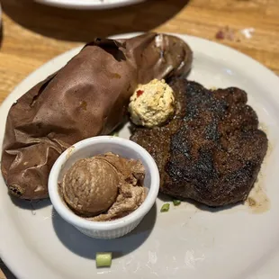 Butterflied filet with six shooter cajun butter and a Sweet potato with cinnamon butter
