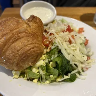 The famous house salad and croissant